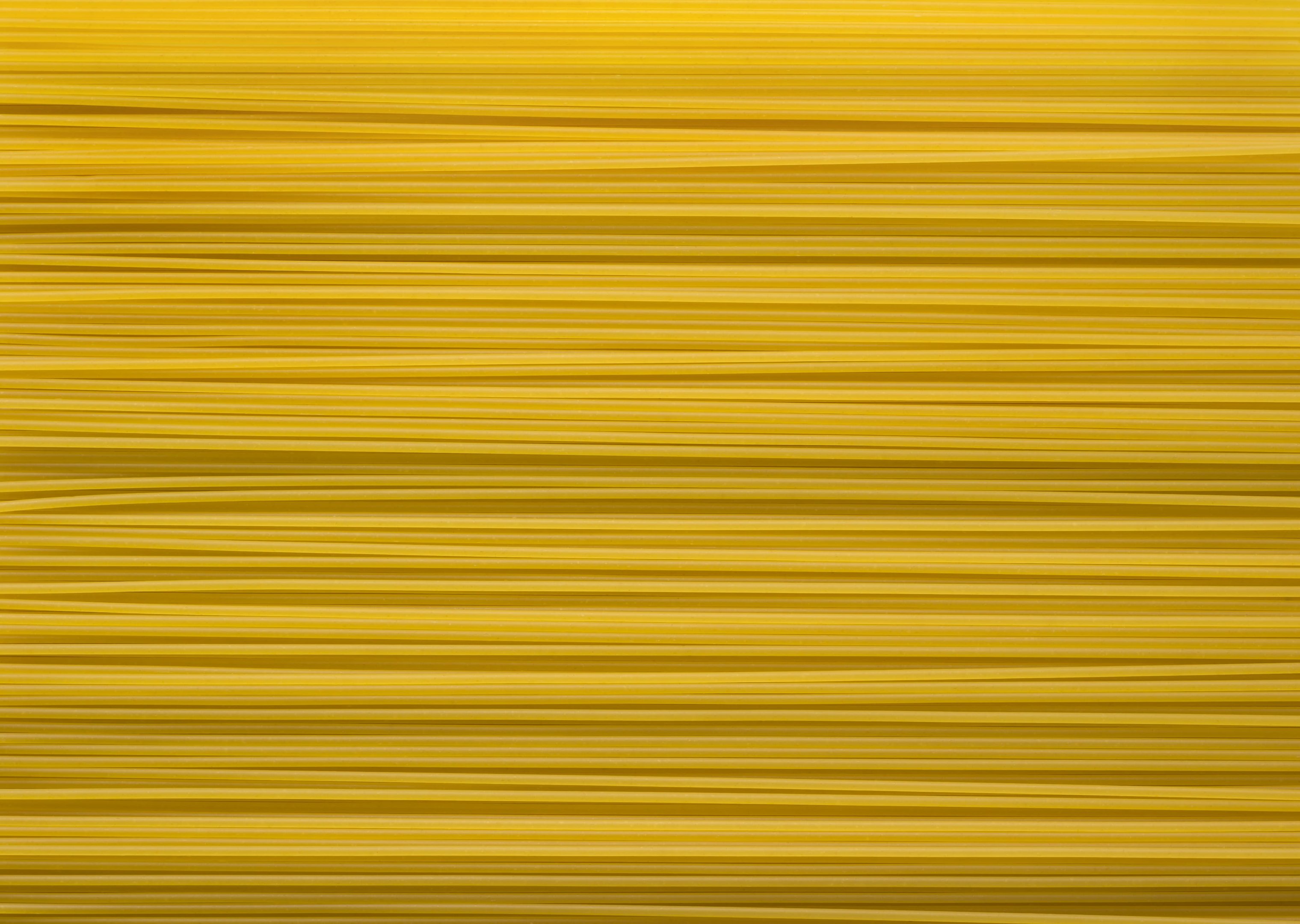 Um fundo de spaghetti em uma textura vibrante.